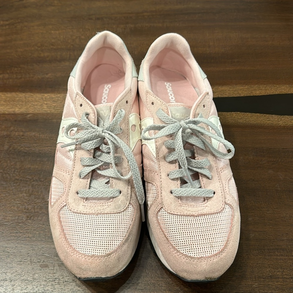 Good condition -Saucony sneaker. Size 9.  Pink.